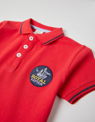 قميص بولو للأولاد من زيبي 'رويال كابتين'، أحمر